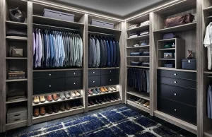 The inside of a well organized men's custom closet.