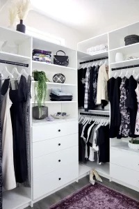 Custom Walk in closet with racks for hanging clothes