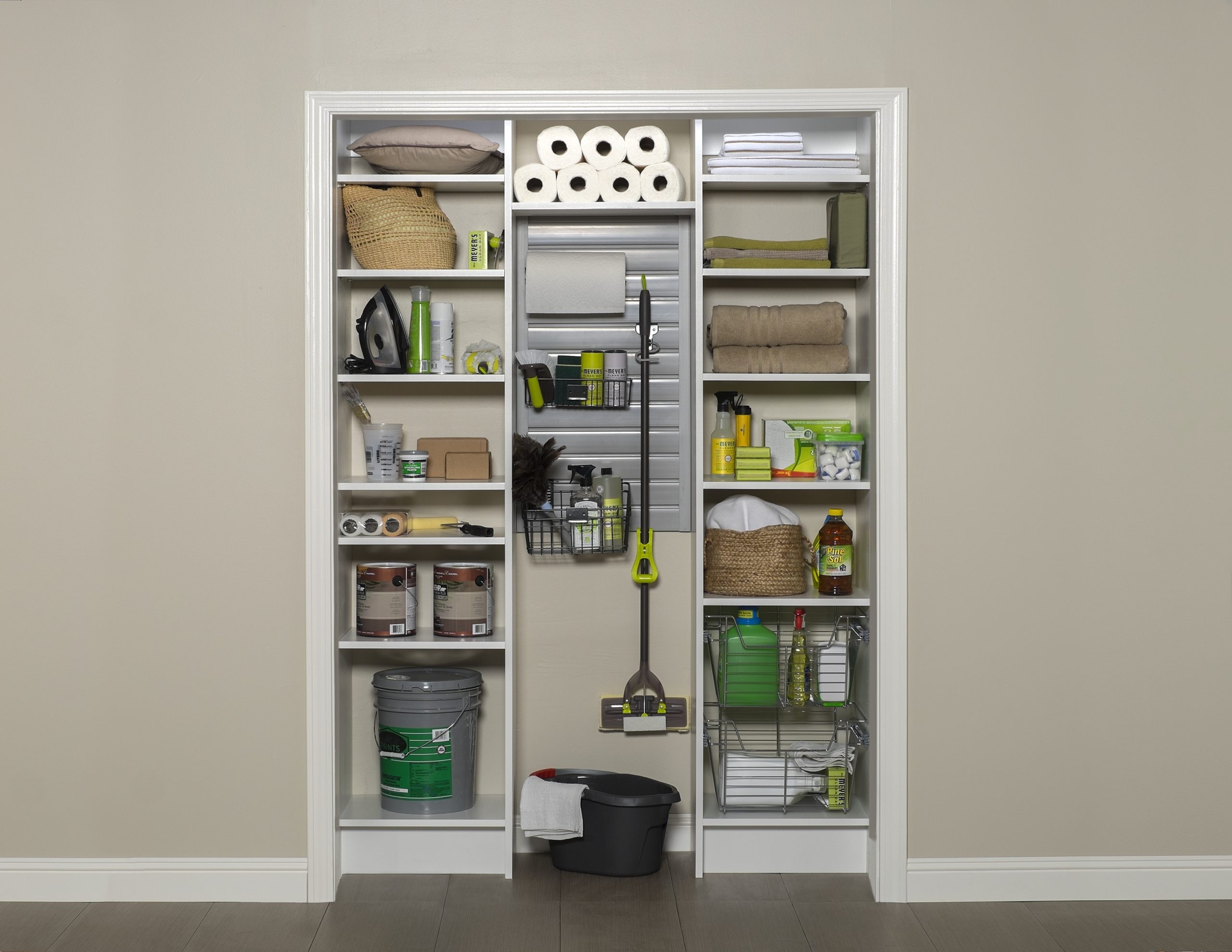 Custom closet system with built in shelving for utility closet. 