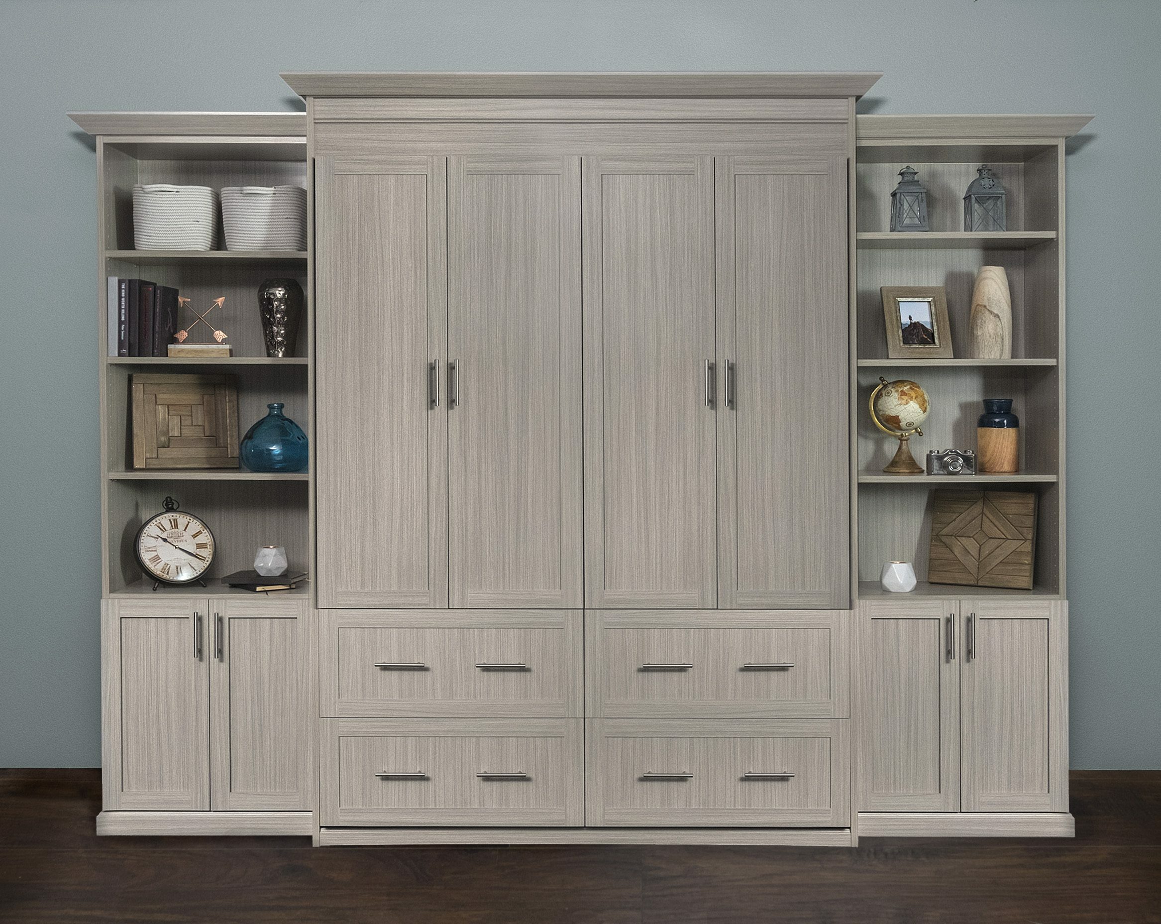 Custom storage solution for the main living area with built in shelves and drawers. 